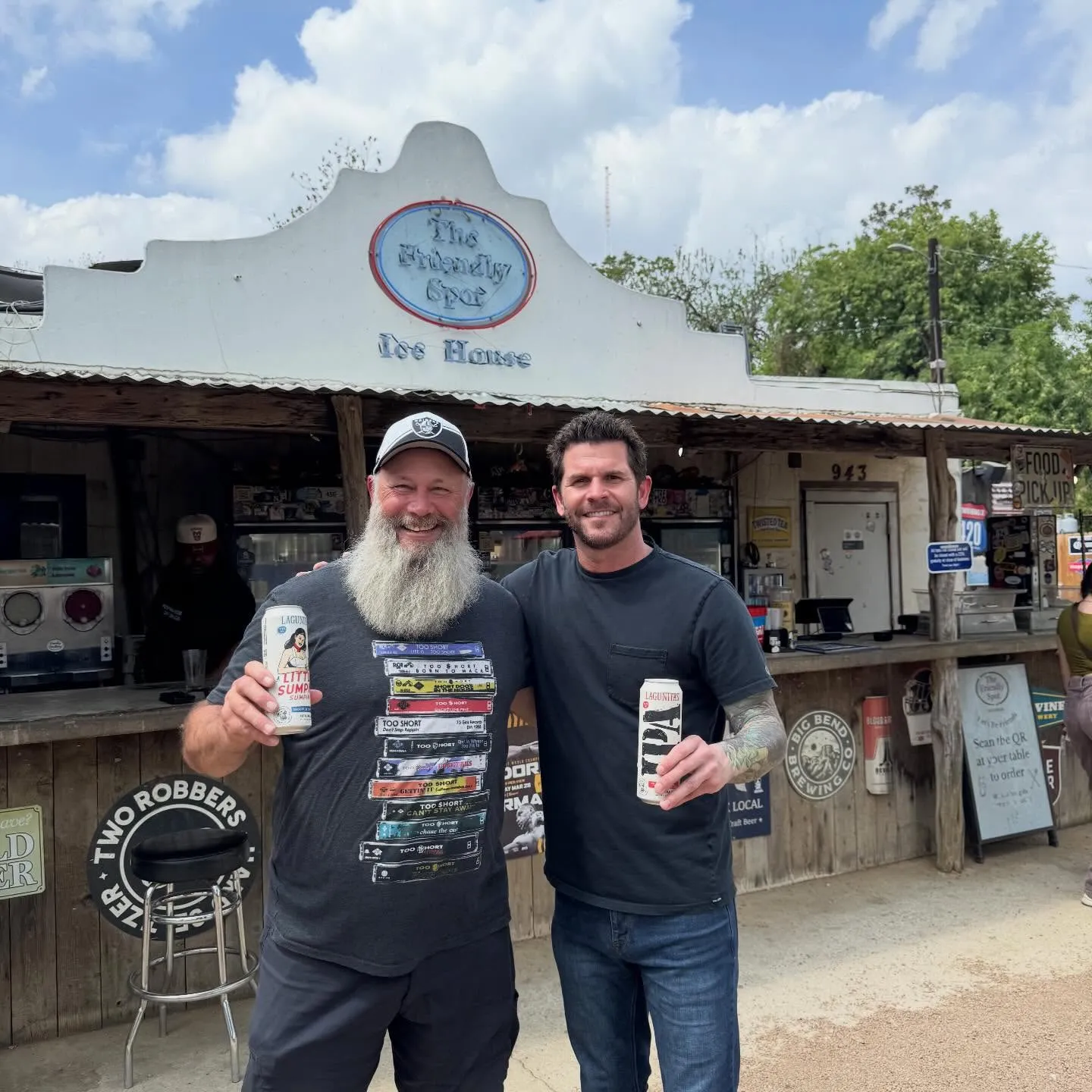 Friends with cold beers out front