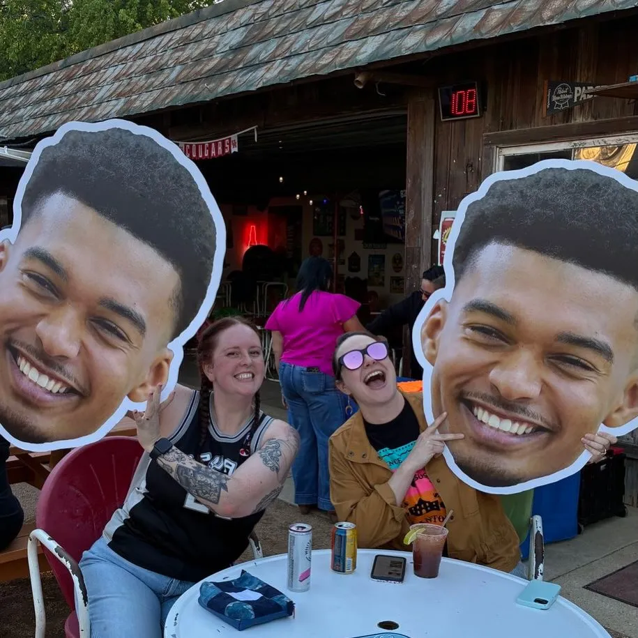Spurs fans with Wemby cutout